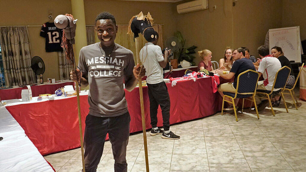 Participants got right into fashioning hobbyhorses, then singing as they rode them around the room.